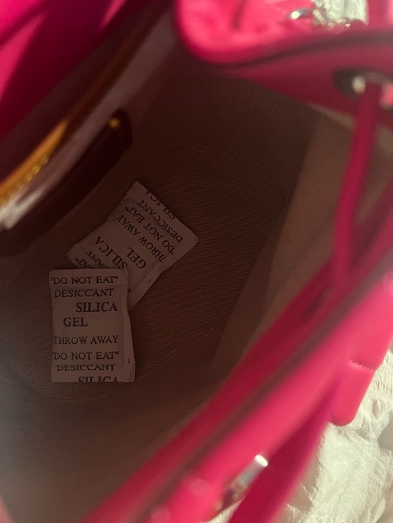 Pink Coach leather backpack